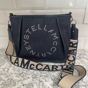Beautiful denim Stella McCartney logo bucket crossbody with logo strap.